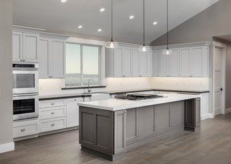 grey and white kitchen with island