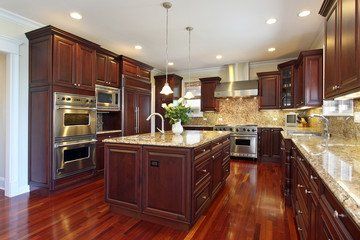 wood and white granite counter top kitchen
