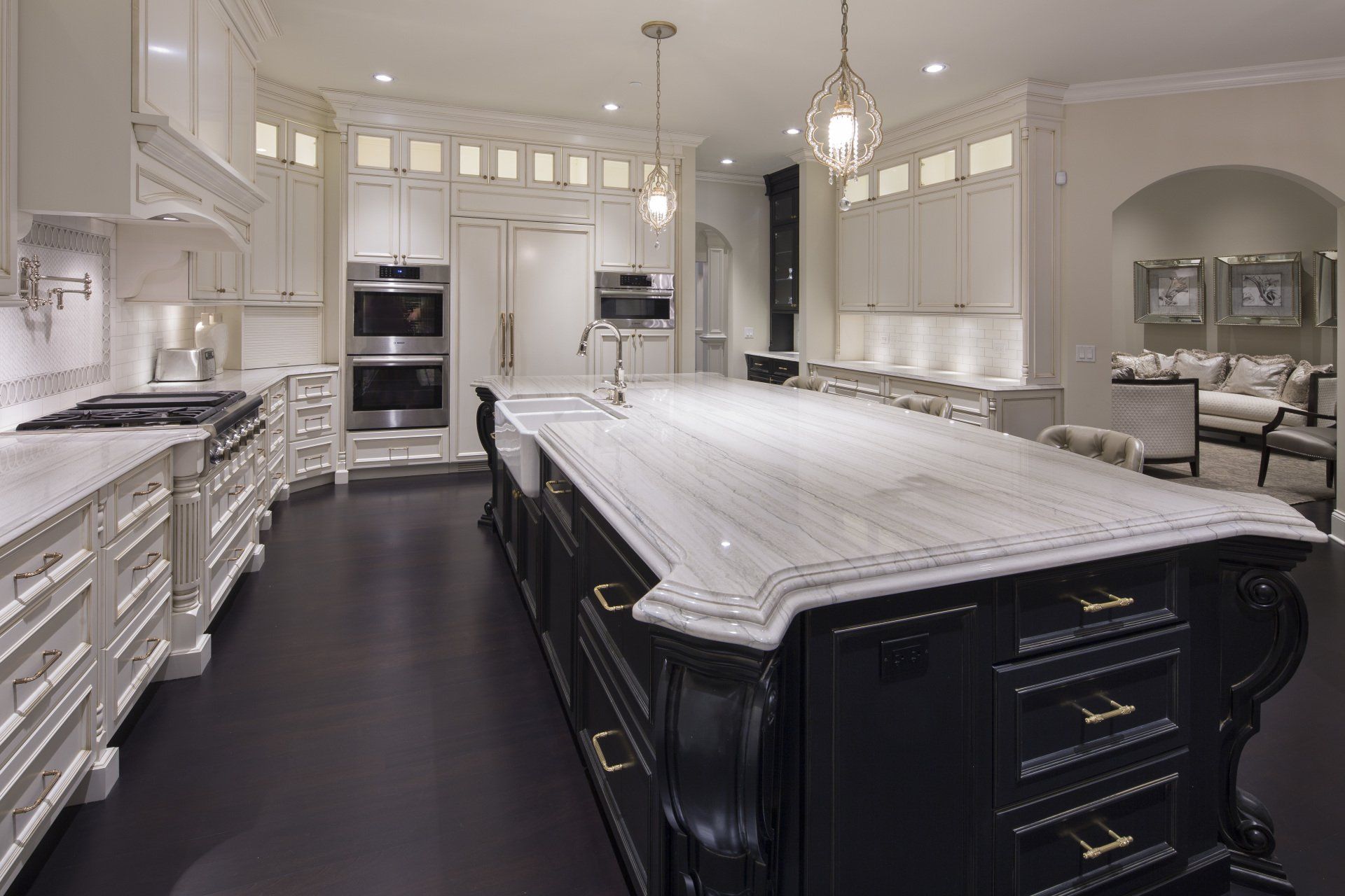There is a large island in the middle of the kitchen.