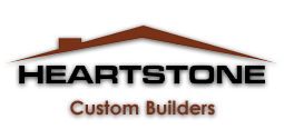 A logo for a company called heartstone custom builders