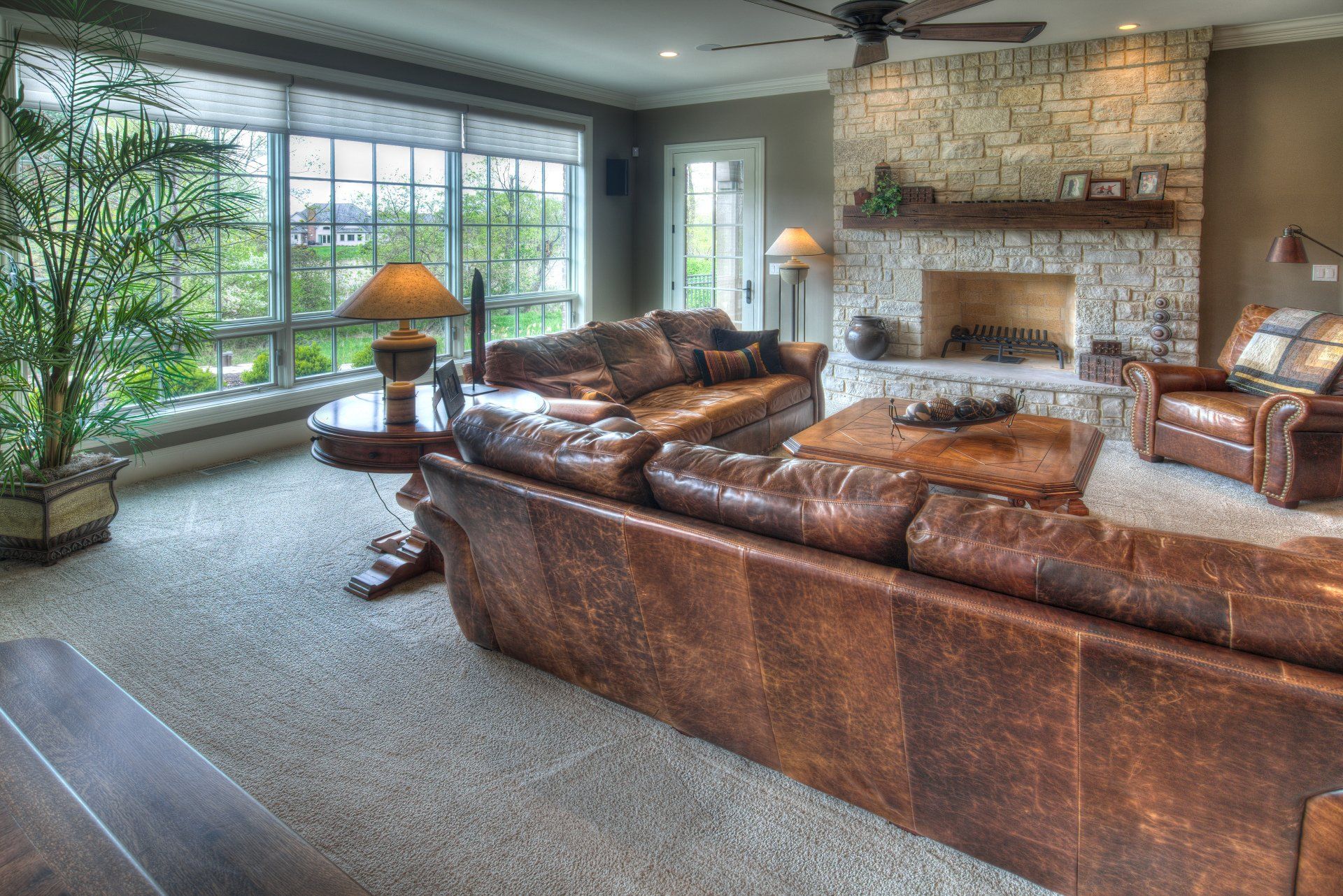 A living room filled with furniture and a fireplace