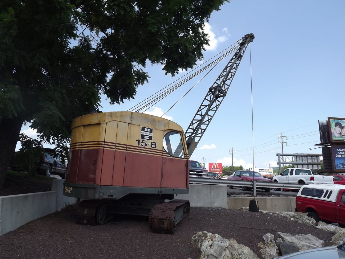 A red and yellow crane with the letters tcr on it