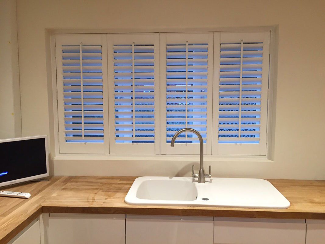 FAUX WOOD SHUTTERS