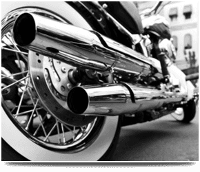 If you want to keep your bike in great shape in Hearne Bay call Hearne Bay Motorcycles Black and white rear view of a classic motorcycle.