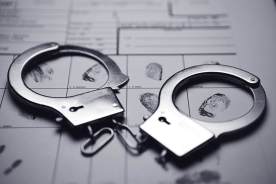 Handcuff—Golden scales of justice, gavel and books - bail bonds in Lancaster, PA