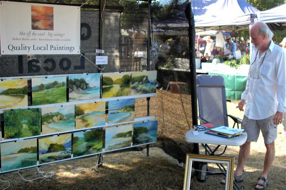 man choosing art painting