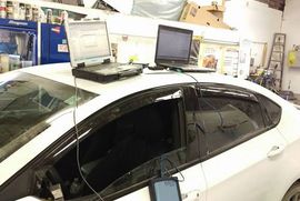 car in mechanic shop