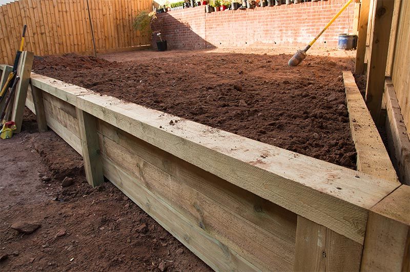 Treated Pine Retaining Wall Under Construction