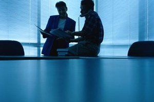 Two Men Discussing | Lakewood, CA | JEC Integration Systems