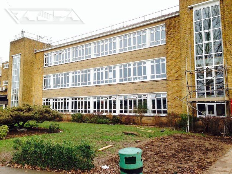 Old fashioned commercial building with large expanse of glass 2