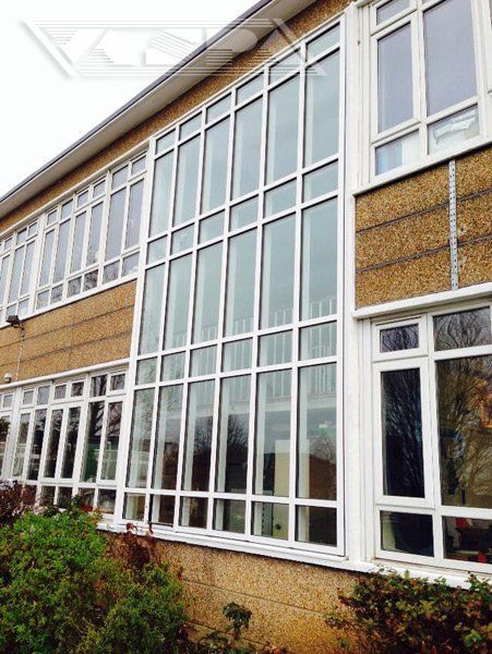 Old fashioned commercial building with large expanse of glass