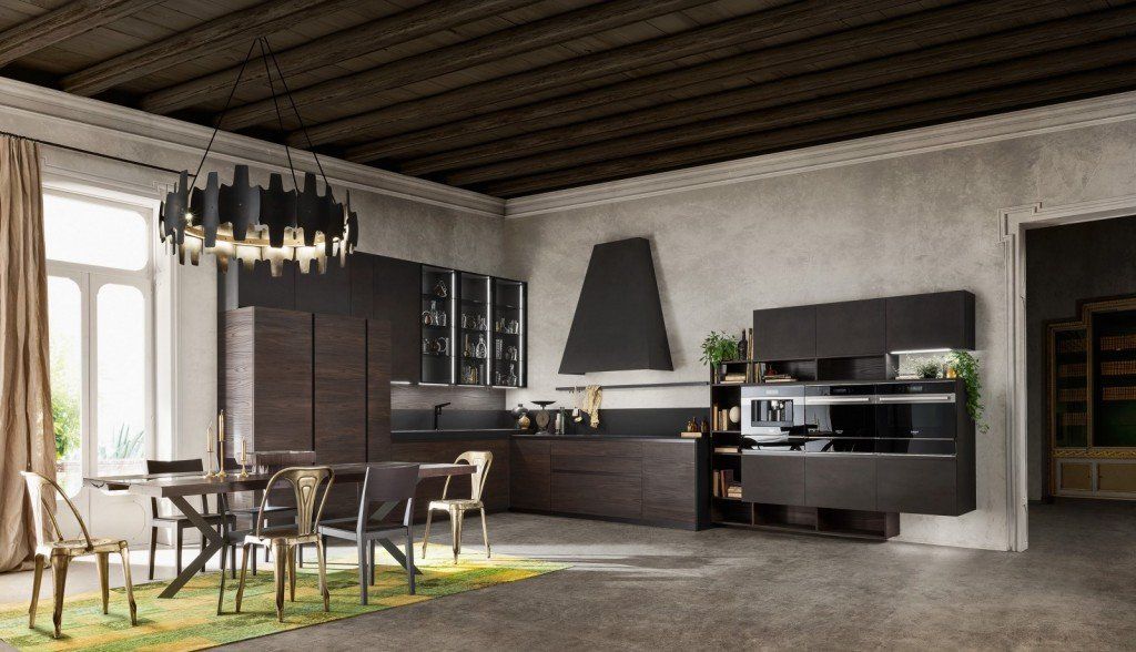 Una cucina con un tavolo e delle sedie
