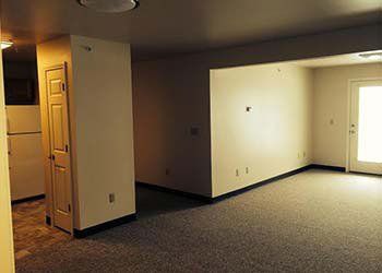 Empty Room with Carpet - Hawks Meadows Apartments in Essex Junction, VT Empty Room with Carpet - Hawks Meadows Apartments in Essex Junction, VT