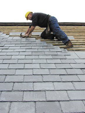 For quality roofing services in Perth call King Roofing on 07724 248 745 roofer on a slate roof
