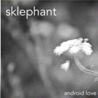 A black and white photo of a flower titled android love