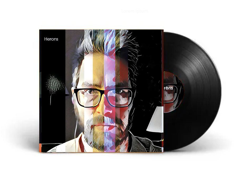 A man with glasses and a beard is on the cover of a record.