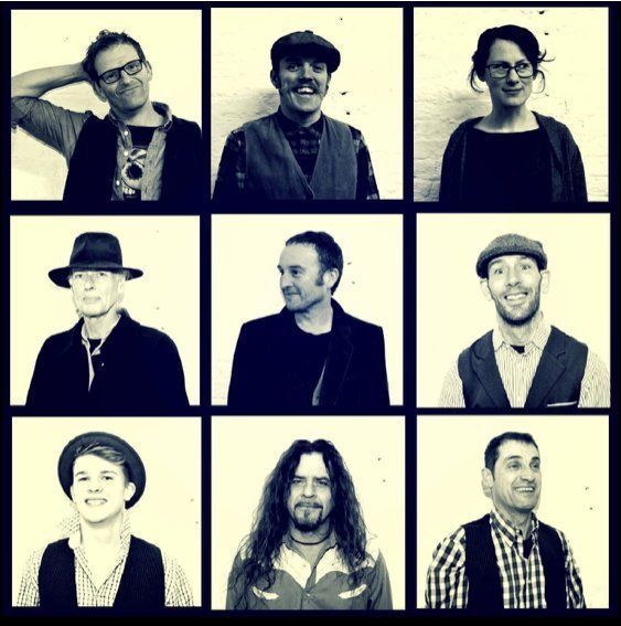 A black and white photo of a group of people