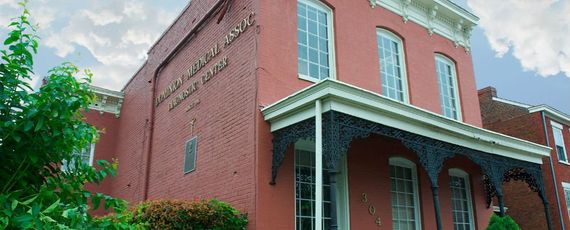 Doctors In Richmond — Red Building With  White Window in Richmond, VA