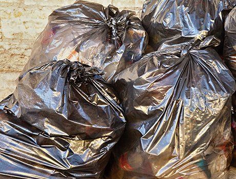 Pile of filled bin bags