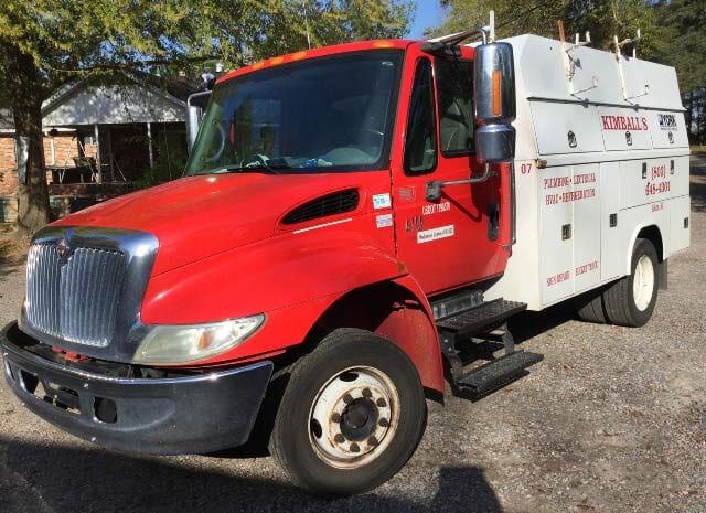 Electrician — Man Fixing the AC in Aiken, SC Electrician — Man Fixing the AC in Aiken, SC