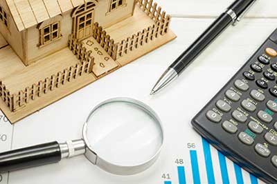 Model house, construction plan for house building, calculator. Real Estate - Homeowners Insurance in Santa Fe, NM Model house, construction plan for house building, calculator. Real Estate - Homeowners Insurance in Santa Fe, NM