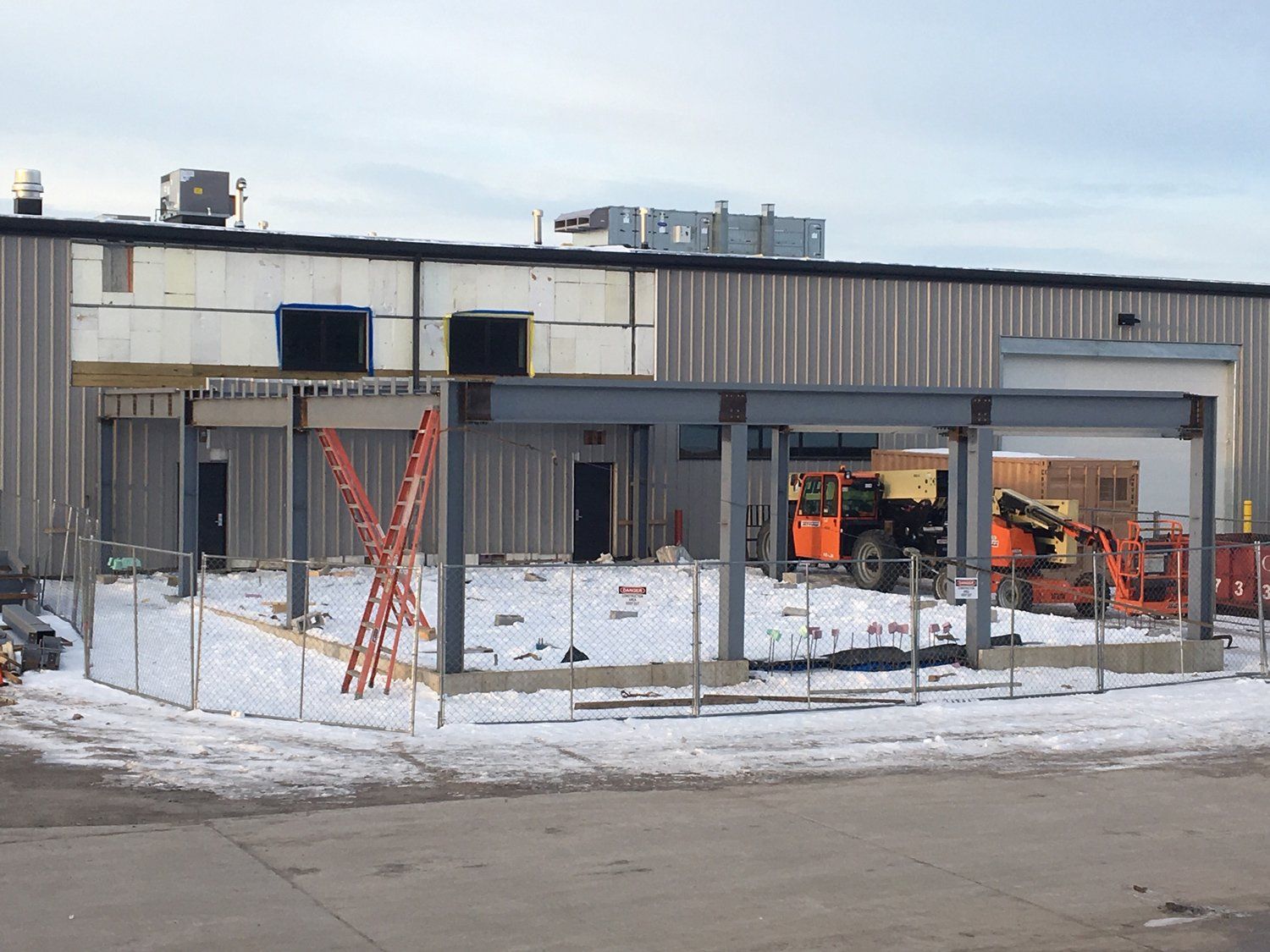 Welding Contractor — Commercial Building With Truck in Westmoreland, NY