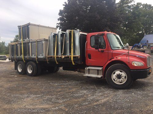 Welding Services — Red Truck Side View in Westmoreland, NY
