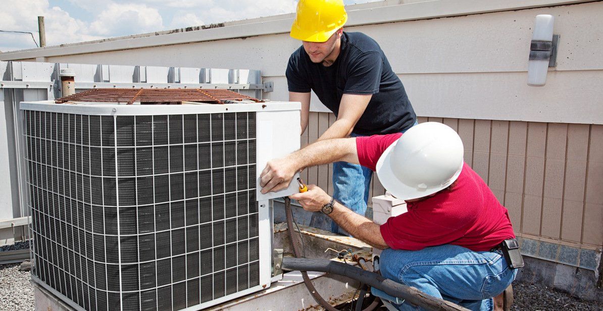 HVAC technician doing HVAC maintenance and repair service in Honolulu, HI