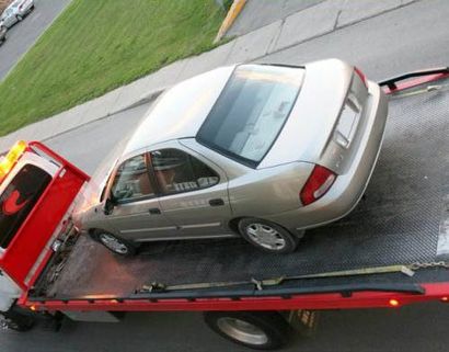 Towed Car - Auto and Truck Wrecking in Beaumont, CA Towed Car - Auto and Truck Wrecking in Beaumont, CA
