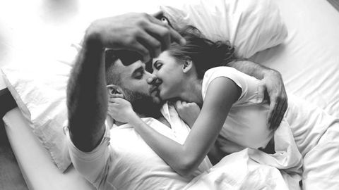 A Couple Lying On The Bed — Lexington, KY — Fantasy Stays