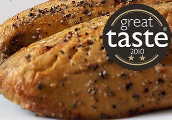 Close-up of baked food with black pepper, a
