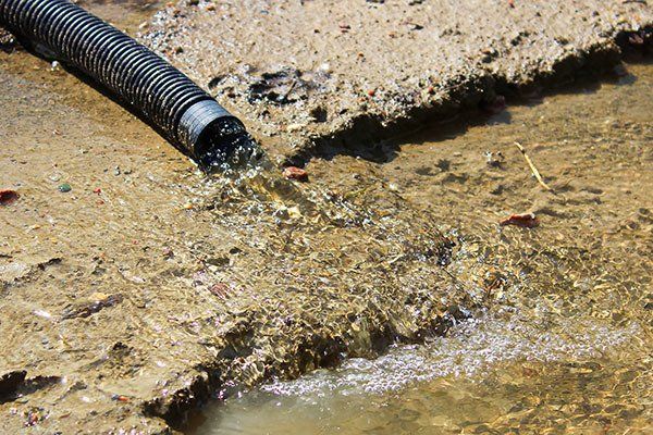 hose draining on ground