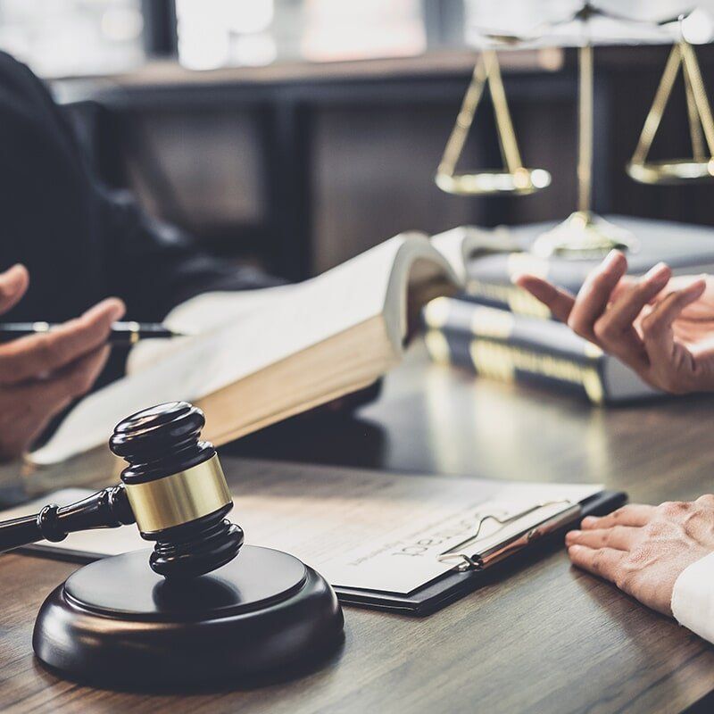 Lawyer and Client Deal — Anderson Telford Lawyers in Townsville, QLD