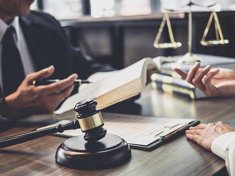 lawyers looking over paperwork
