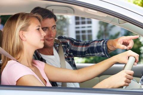 Man teaching a woman to drive, Sherman, TX Man teaching a woman to drive, Sherman, TX