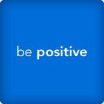 A blue square with the words be positive on it