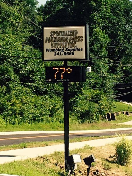 A road sign for a plumbing supplies distribution company near Fort Mitchell, KY