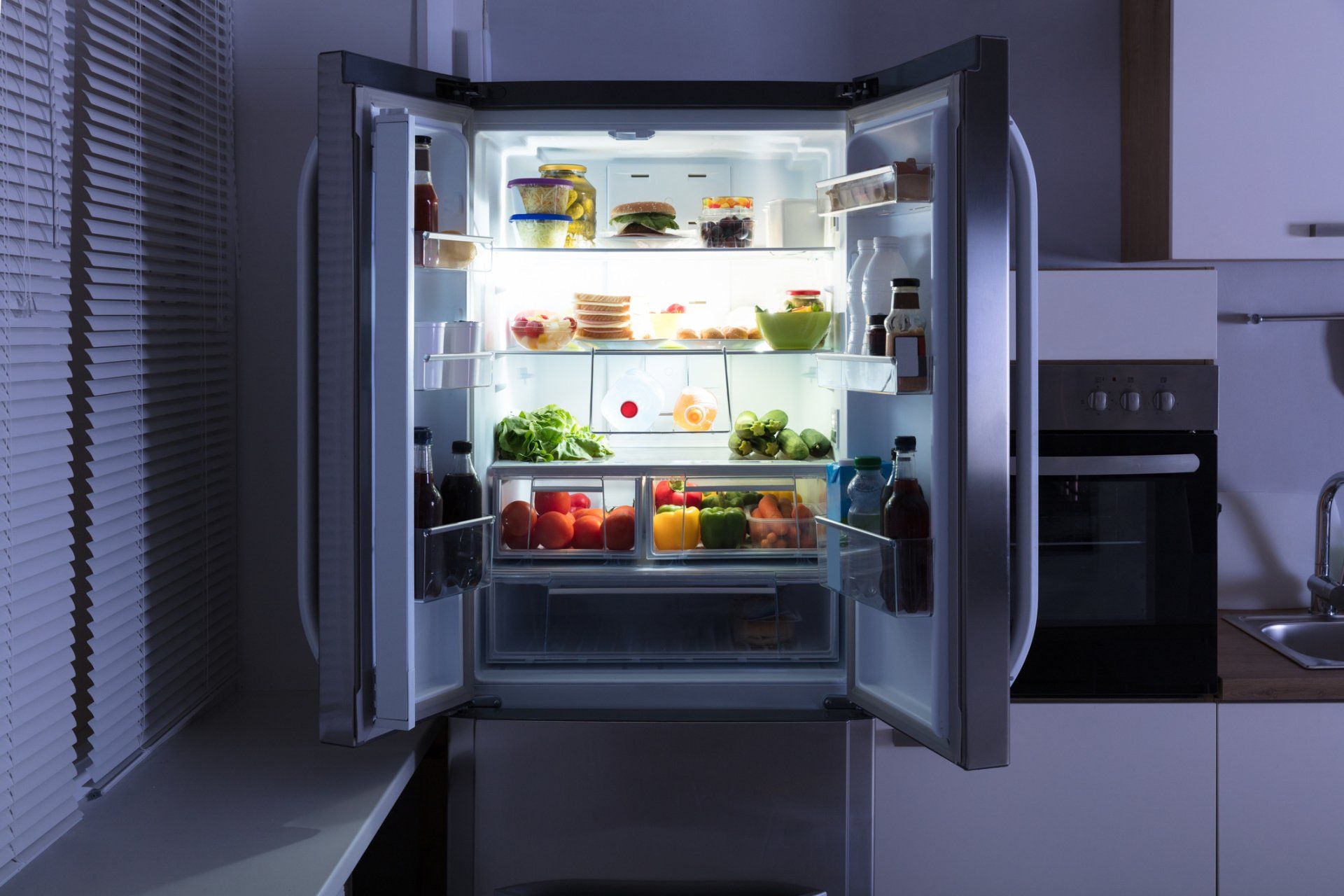Open Refrigerator in Kitchen — Buhler, KS — Reimer Refrigeration Open Refrigerator in Kitchen — Buhler, KS — Reimer Refrigeration
