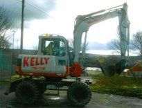white coloured digger