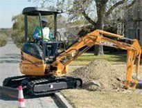 man driving a digger