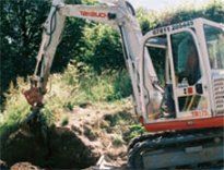 white coloured digger