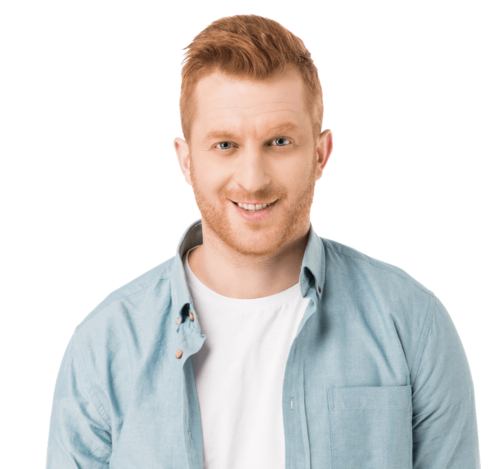Man with red hair, smiling. Wearing a light blue open shirt over a white t-shirt. White background.