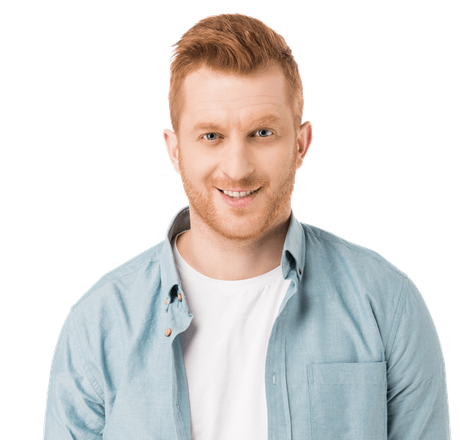 Man with red hair, smiling in light blue open shirt over white t-shirt.