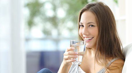 Lady Drinking Water - Water Conditioner in Indianapolis, IN Lady Drinking Water - Water Conditioner in Indianapolis, IN