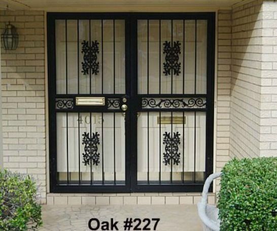 a wrought iron door with oak # 227 written on the bottom