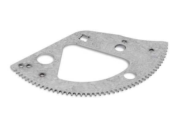 Gray metal sector gear with teeth along the curved edge and holes for mounting.
