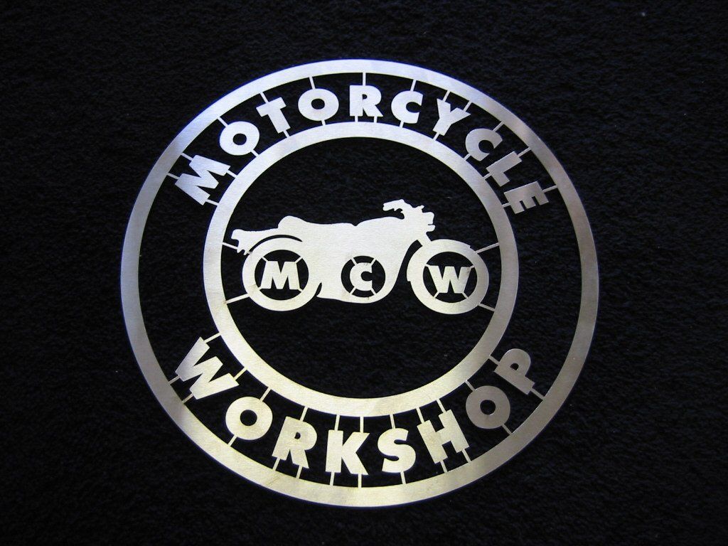 Silver logo on black background: 