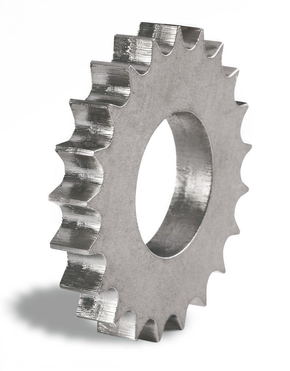 Silver sprocket gear with multiple teeth, casting a shadow on a white background.