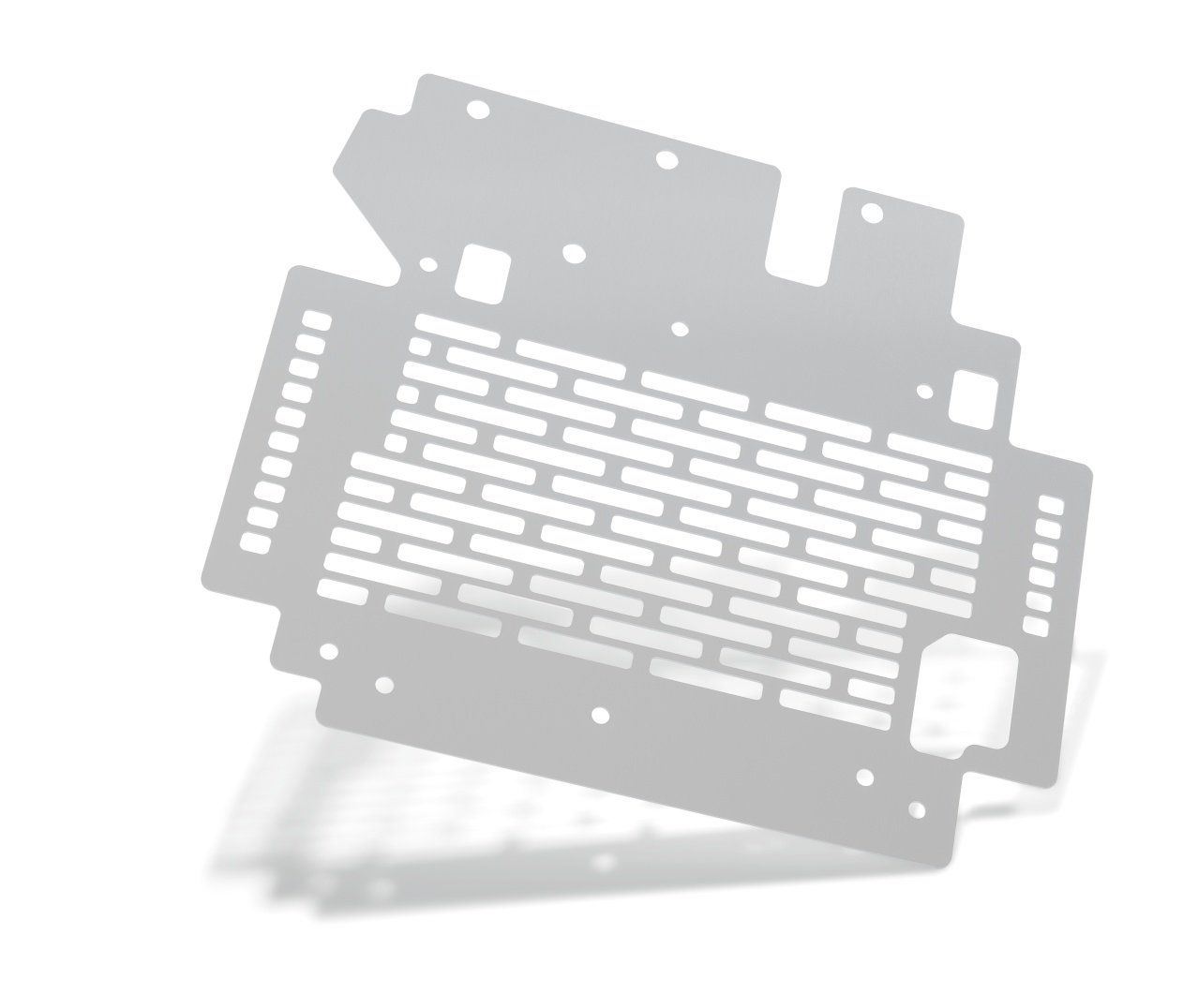 Silver metal computer case panel with rectangular and square holes, and a brick-like vent pattern.