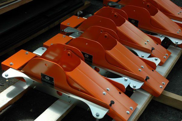 orange metal parts
